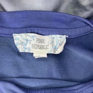 Pink republic blue shirt.